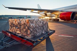 Air cargo shipment being loaded onto an aircraft
