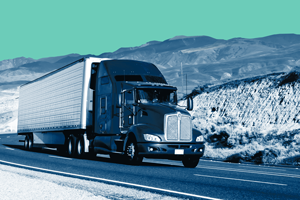 Truckload shipment moving down the highway.
