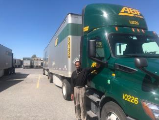 ABF road driver Marshall Land with his ABF truck  