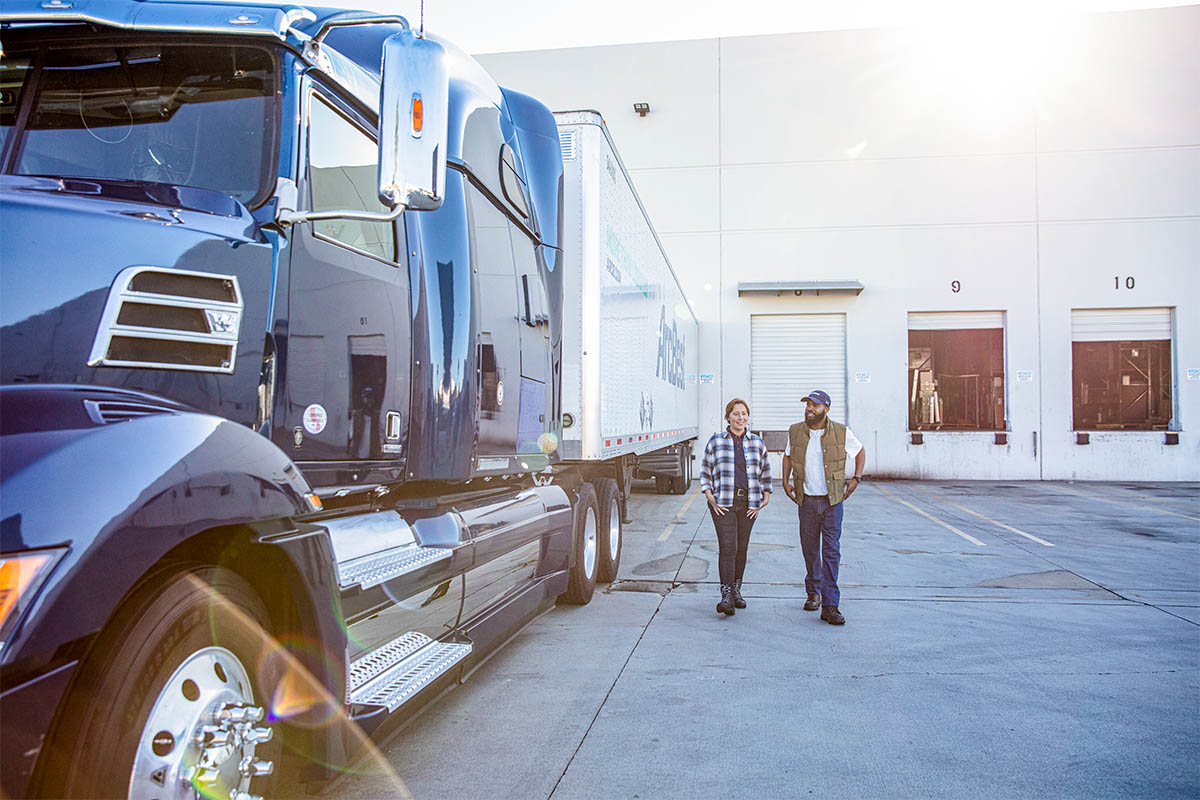 ArcBest drivers walking next to a truck