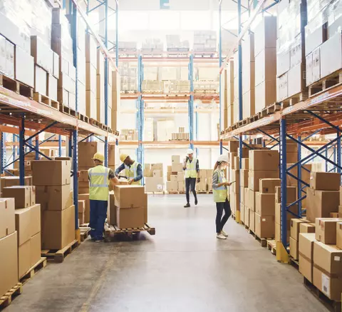 Shipments being loaded in a warehouse.