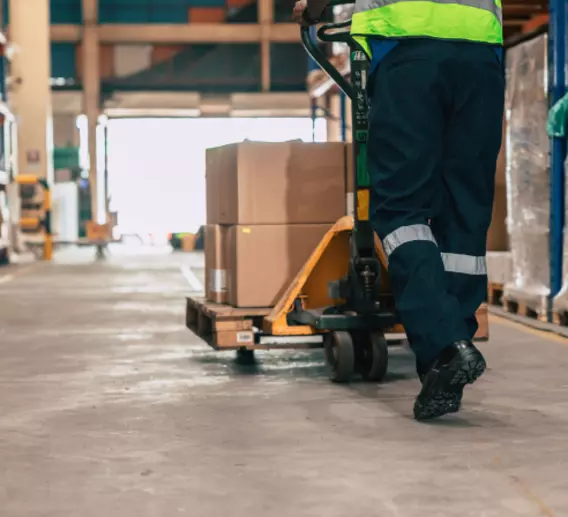 Freight being moved on a loading dock