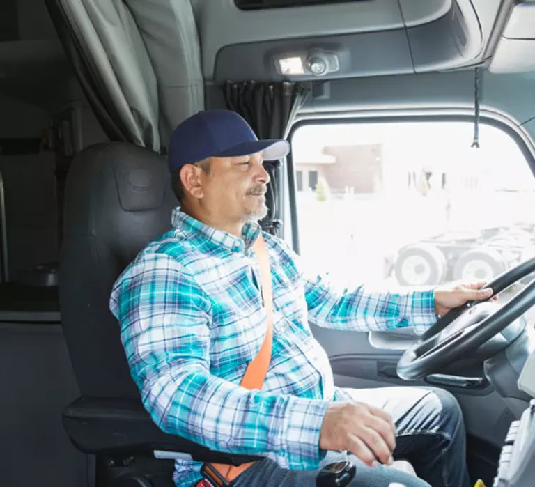 Owner Operator driving tractor trailer