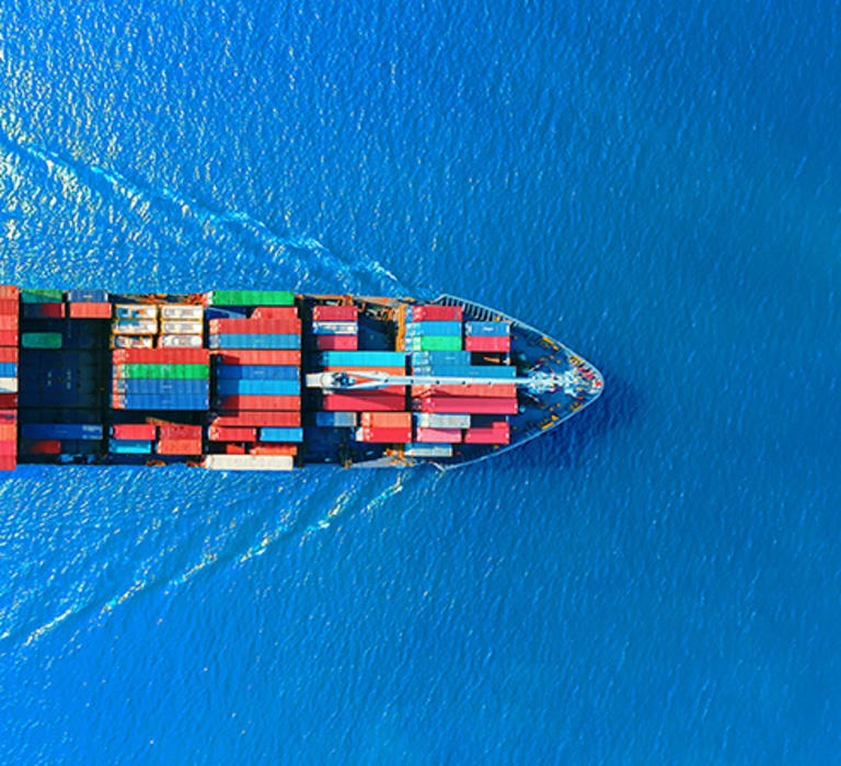 Aerial view of ocean vessel with containers