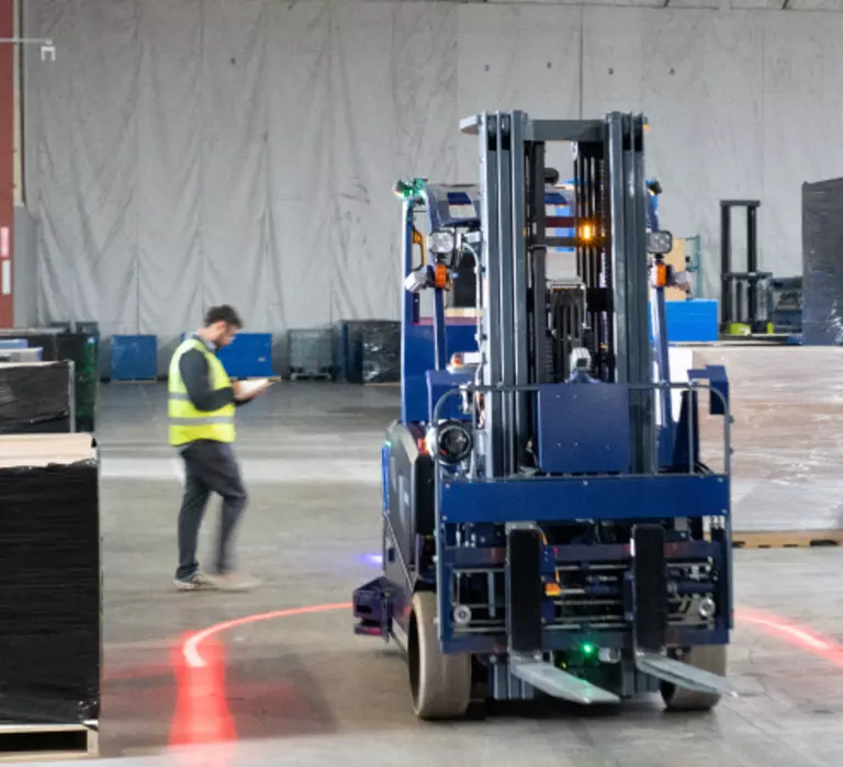 Vaux Smart Autonomy forklift in a warehouse.