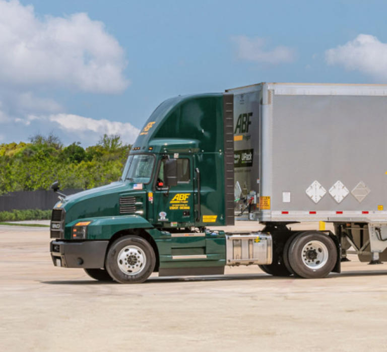 ABF Freight truck parked in a lot.