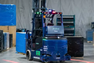 Vaux Smart Autonomy AMR forklift in a warehouse 