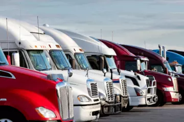 Row of parked semi trucks