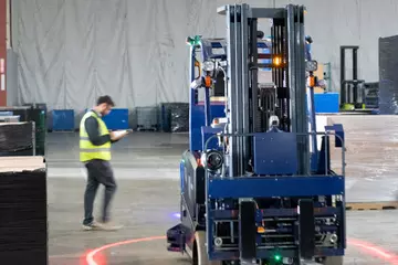 Vaux Smart Autonomy forklift in a warehouse.