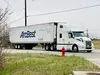 ArcBest trailer and Panther truck moving down the highway