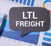 A chart and pen with a speech bubble reading, "LTL Freight."