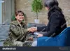 https://www.shutterstock.com/image-photo/middleaged-military-woman-talking-professional-psychologist-2332536477